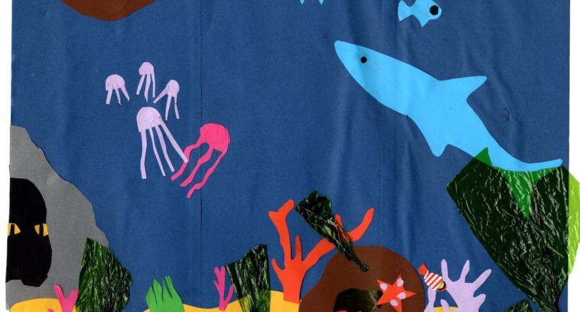 an underwater scene made out of cut paper