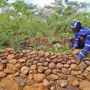 Ethiopian farmers use modern and traditional methods to help save their farms